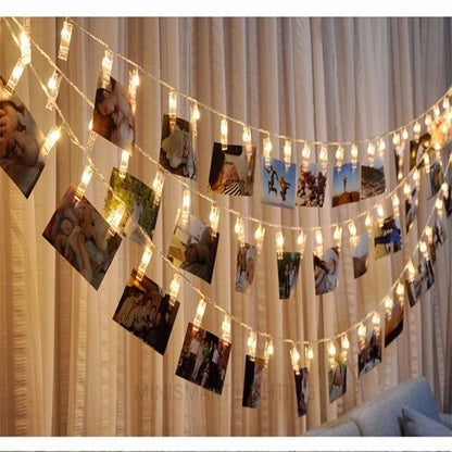 Kreative Nutzung der Foto Lichterkette LED mit warm-weissen Lichtern und Bildern, ideal für Veranstaltungen wie Hochzeiten oder Geburtstagsfeiern.