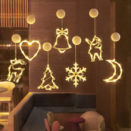 Fensterdeko mit LED Motiven Herz, Glocke, Schneeflocke und Mond